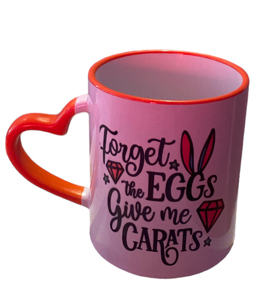 Forget the eggs give me carats Easter mug